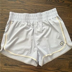 Vuori Women's Athletic Shorts in Light Gray with Cream Trim